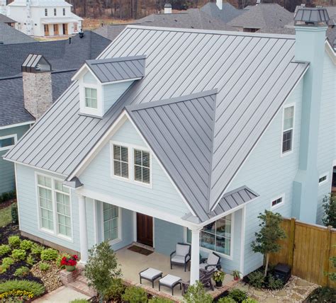 withe house with metal roof|houses with charcoal metal roof.